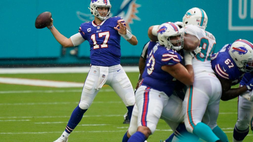 Josh Allen throws against Miami Dolphin