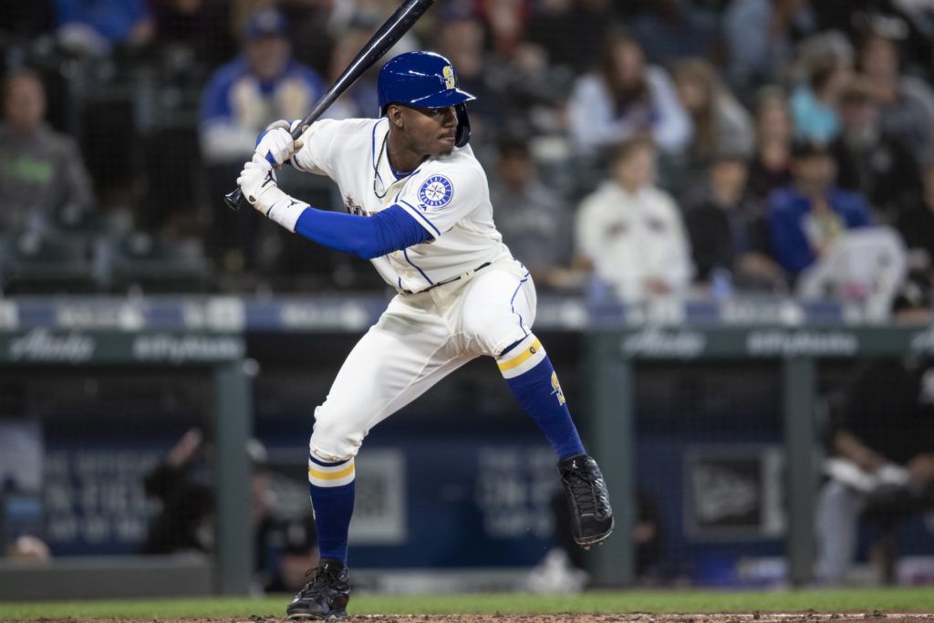 Kyle Lewis takes a swing at the plate.