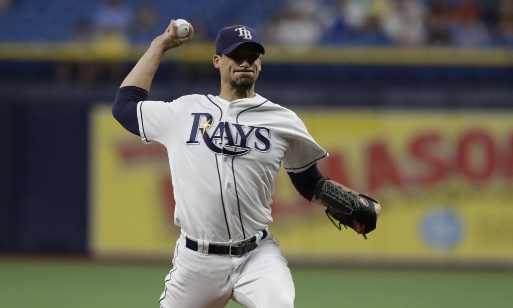 Charlie Morton pitches for Rays