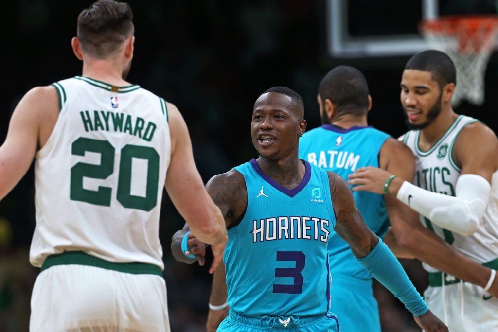 Gordon Hayward shakes Terry Rozier's hand