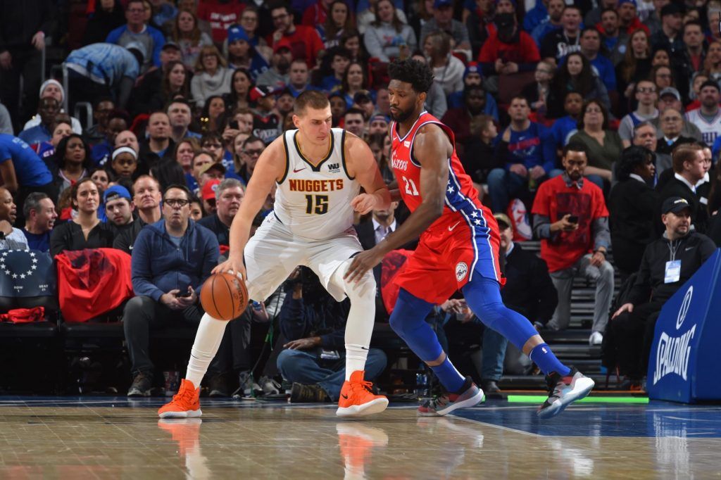 Joel Embiid guards Nikola Jokic