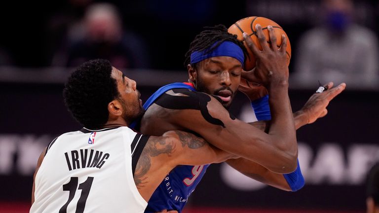 Kyrie Irving guards Jerami Grant