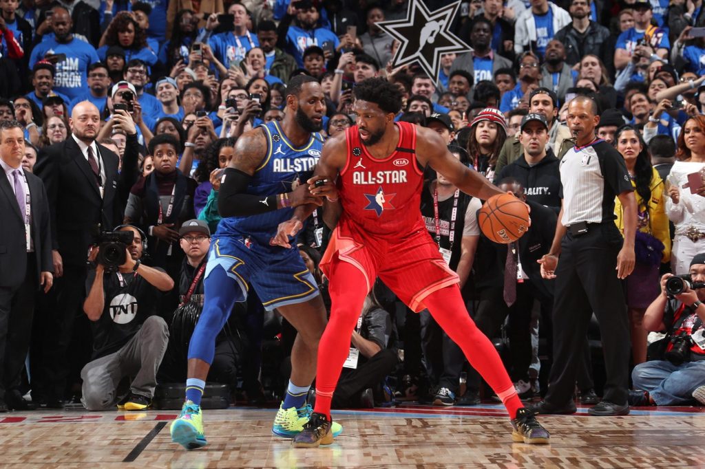 LeBron James guards Joel Embiid