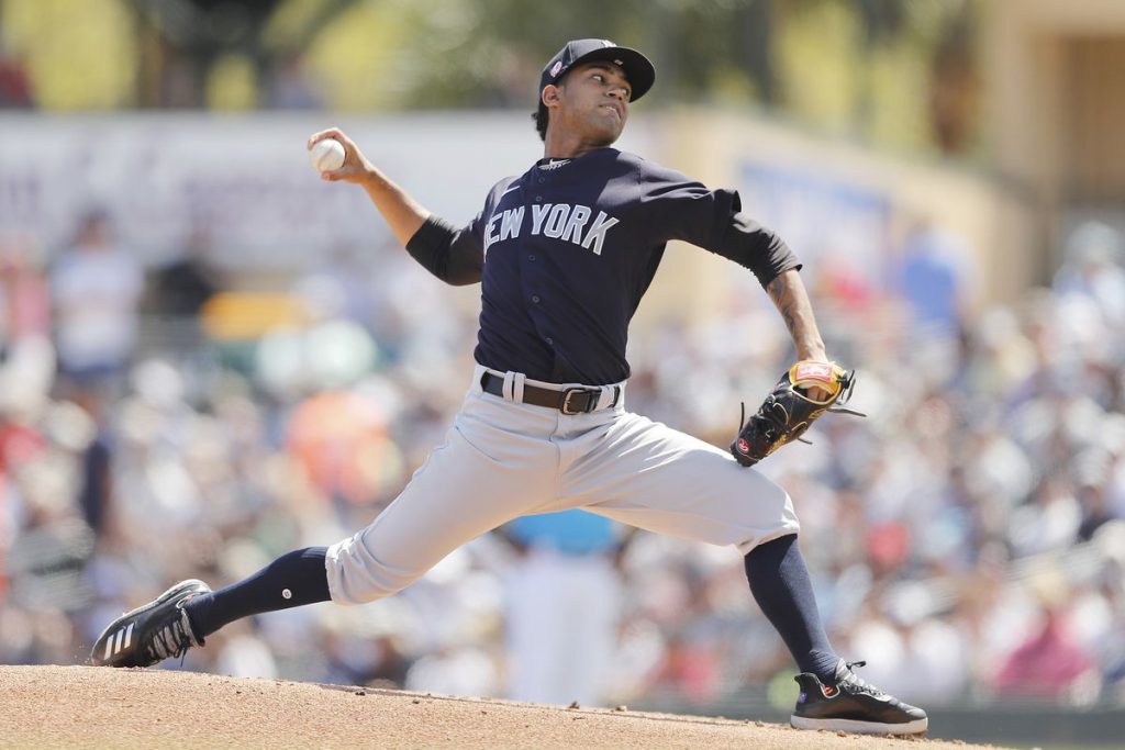 Deivi Garcia throws pitch