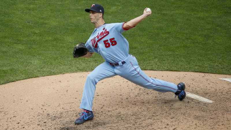 Taylor Rogers throws pitch